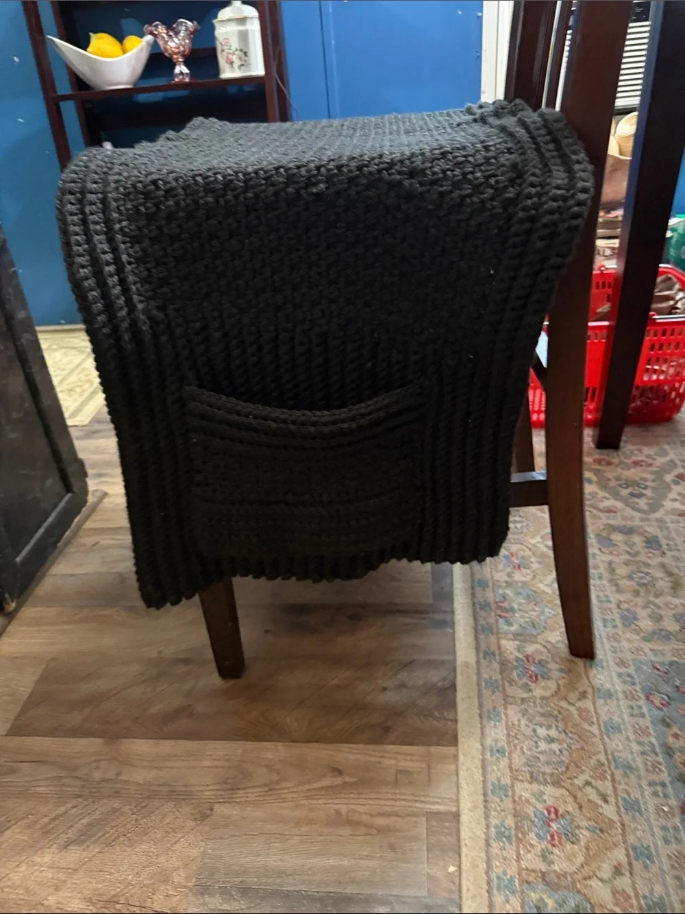Artisan Black Ribbed Knit Throw Blanketwith pockets for storing things on couch